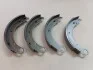 Колодка тормозная ГАЗ 3110 Волга задняя комплект (2 с длинными + 2 короткими накладками) RIDER 3110-3502090 (фото 1)