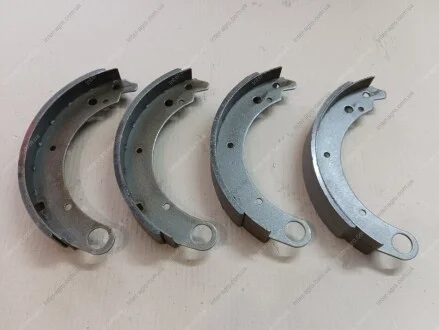 Колодка тормозная ГАЗ 3110 Волга задняя комплект (2 с длинными + 2 короткими накладками) RIDER 3110-3502090