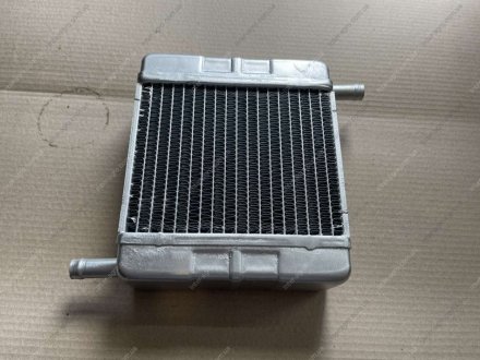 Радиатор отопителя МТЗ 80,82 (алюминий) (патрубки в разные стороны) (S.I.L.A.) S.I.L.A. 1216.8101060-01 (фото 1)